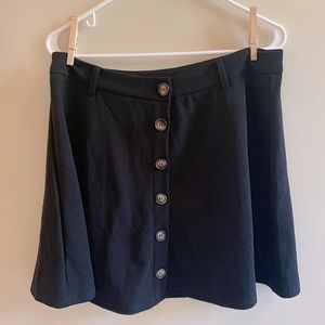 Black follow button skirt, stretchy with belt loop